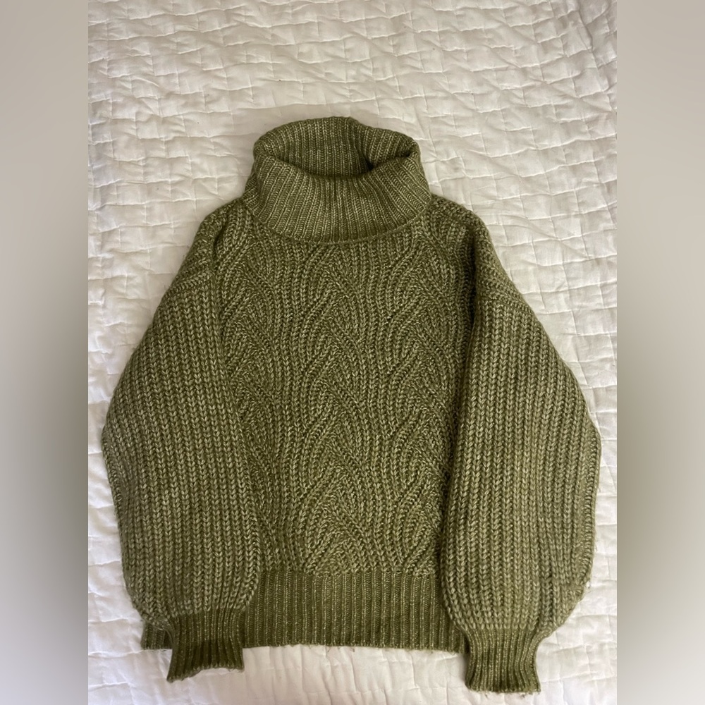 Chunky oversized cable knit turtleneck sweater